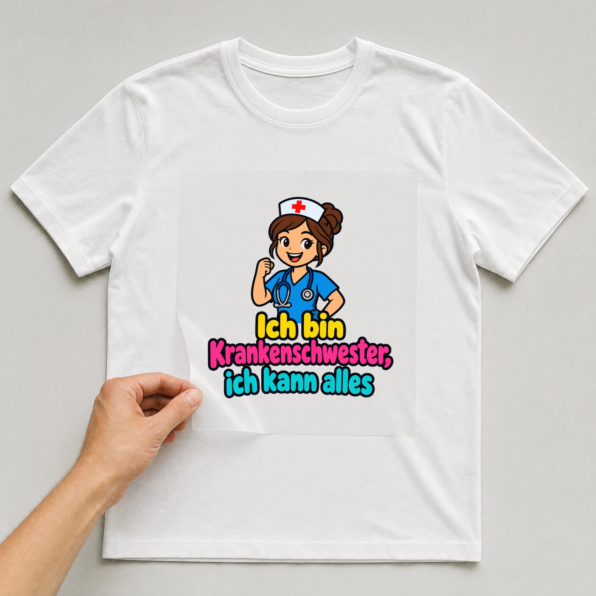 Bügelbild „Ich bin Krankenschwester, ich kann alles“ auf weißem T-Shirt, Folie wird aufgelegt