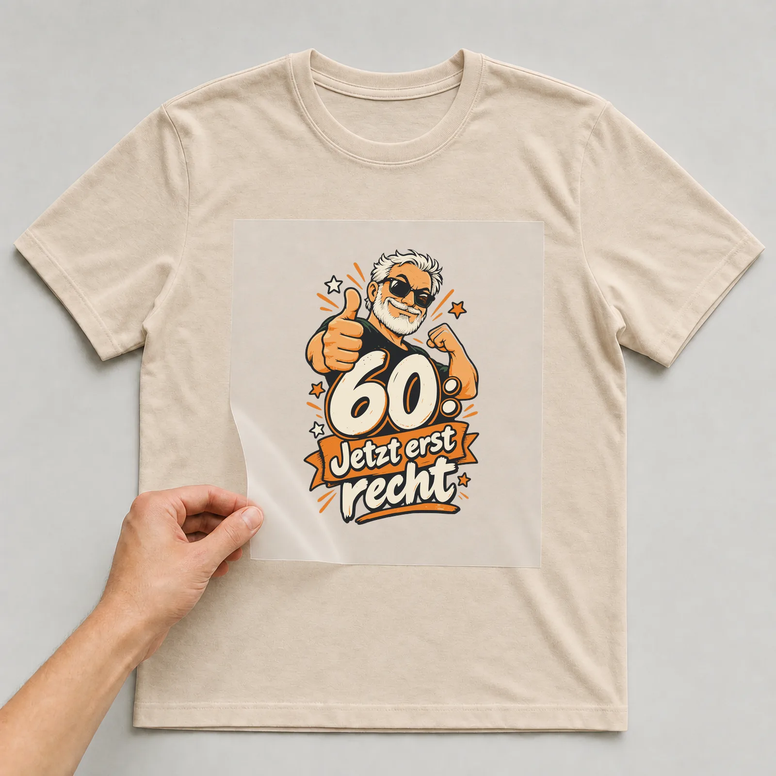 Bügelbild 60: Jetzt erst recht auf beigem T-Shirt, Folie wird aufgelegt
