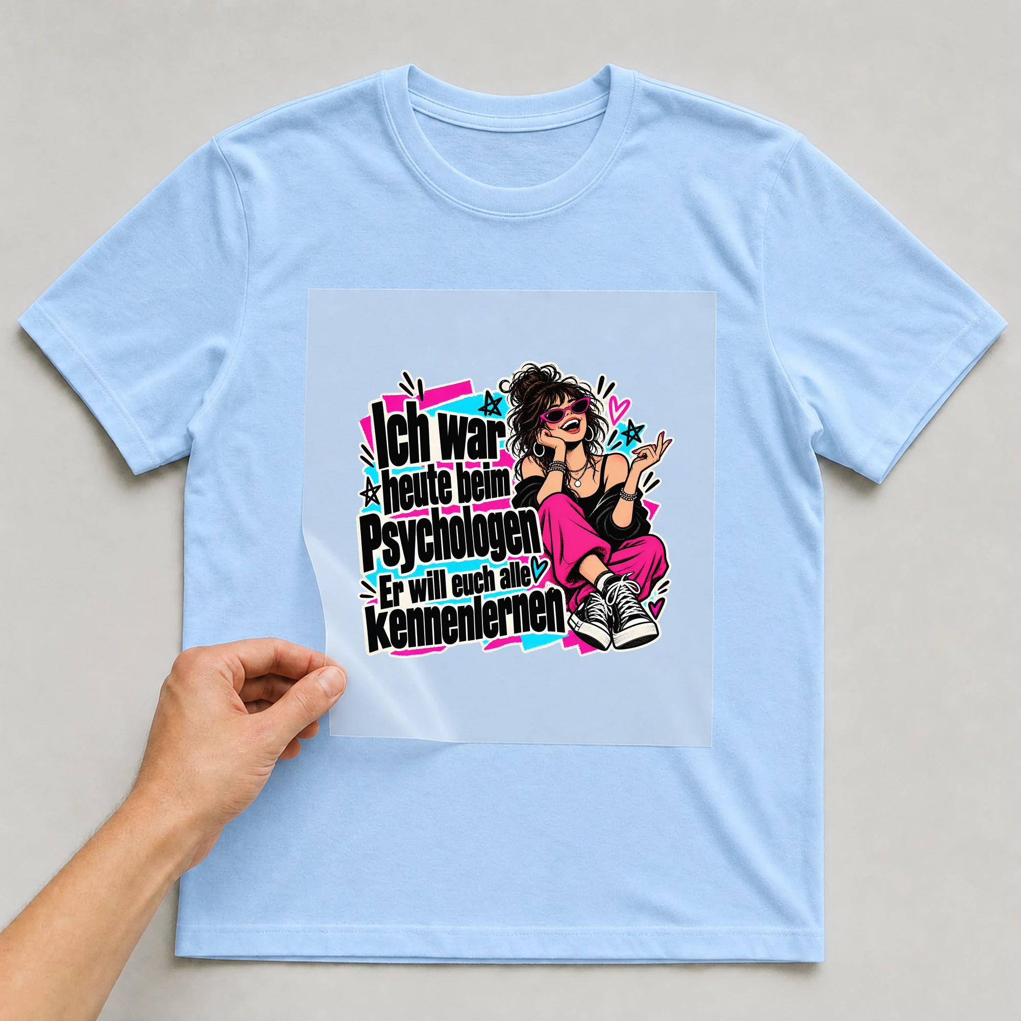 Bügelbild „Ich war heute beim Psychologen“ auf babyblauem T-Shirt, Folie wird aufgelegt