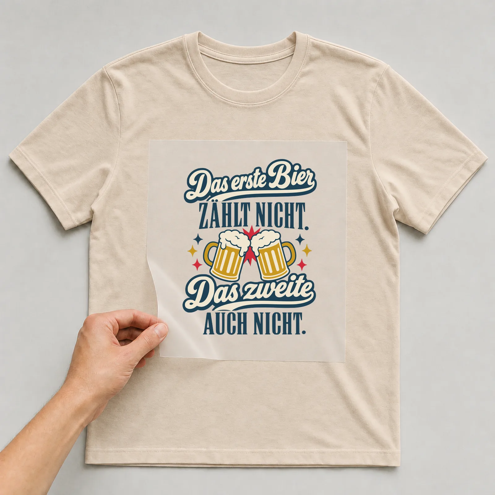Bügelbild Das erste Bier zählt nicht auf beigem T-Shirt, Folie wird aufgelegt