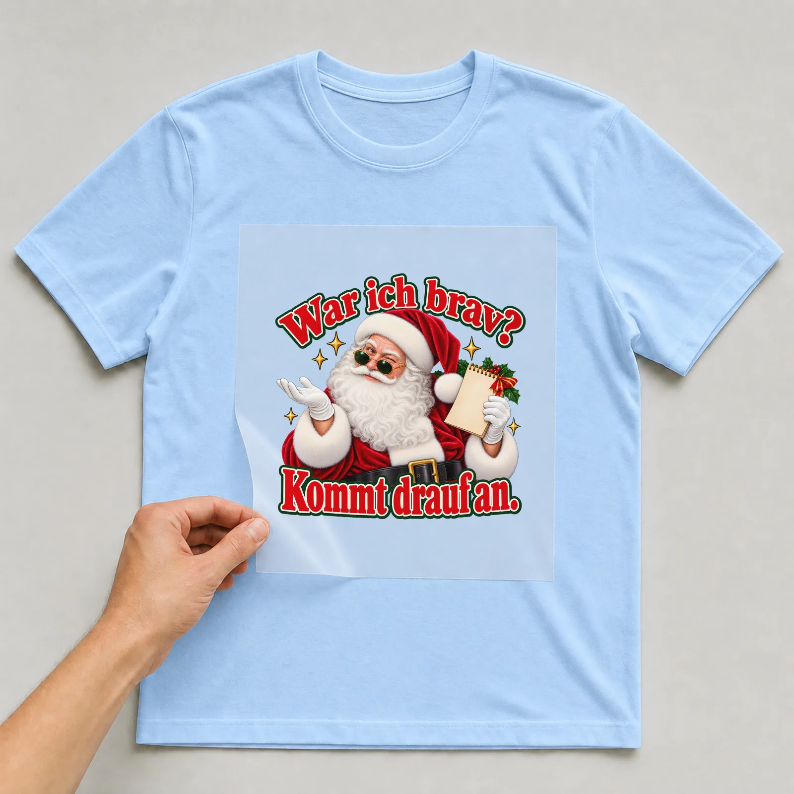 Bügelbild war ich brav cheeky auf hellblauem T-Shirt, Folie wird aufgelegt