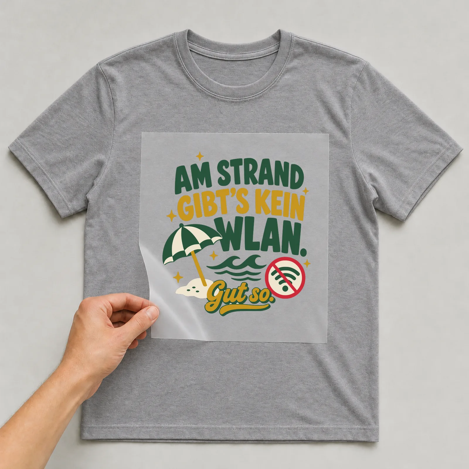 Bügelbild Am Strand gibt’s kein WLAN. Gut so. auf grauem T-Shirt, Folie wird aufgelegt